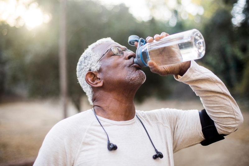 man drinking water