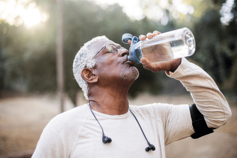 man drinking water